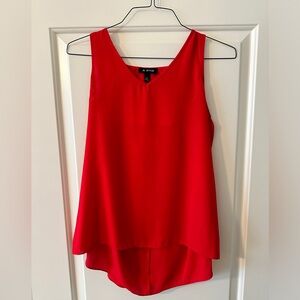 Red Sleeveless Blouse in Medium.